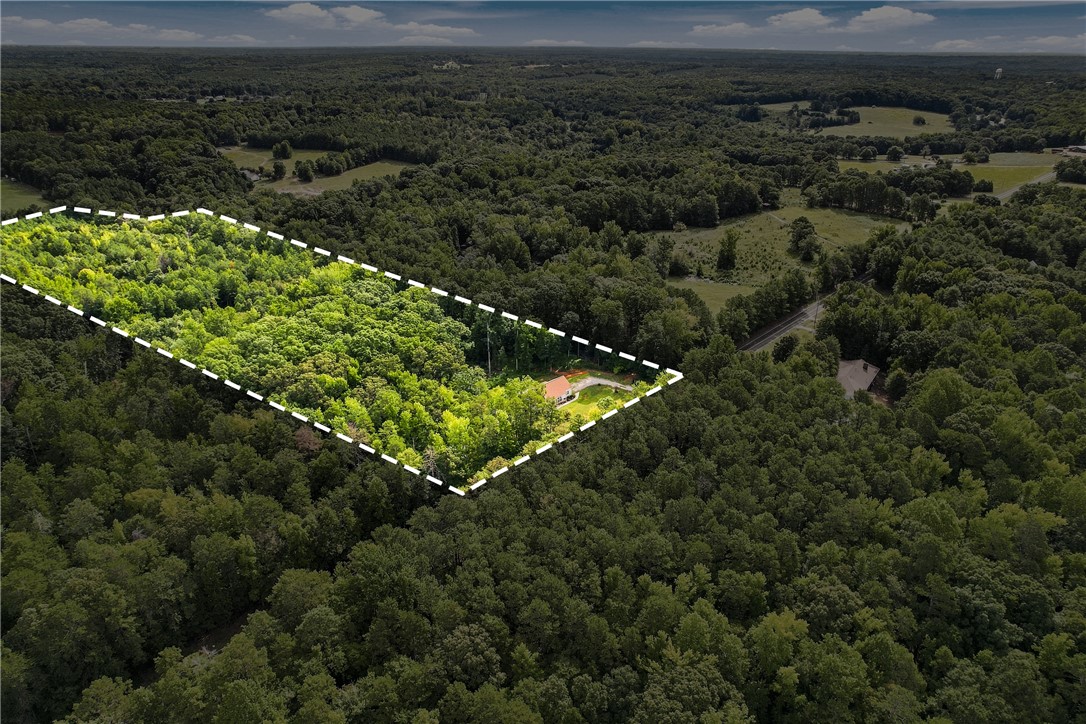 525 Shirley Store Road Anderson, SC 29621 - Photo 40 of 46 Dense woodlands encircle this private property, offering ultimate seclusion and natural beauty.
