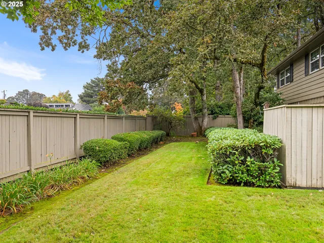 a view of a backyard with garden