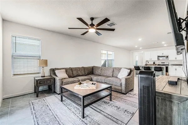a living room with furniture and a window