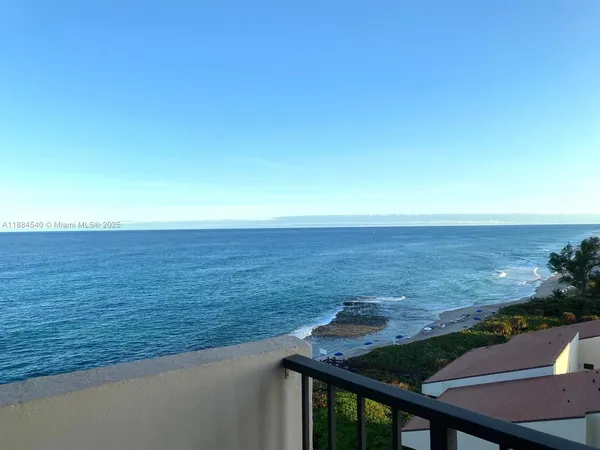 a view of an ocean from a balcony