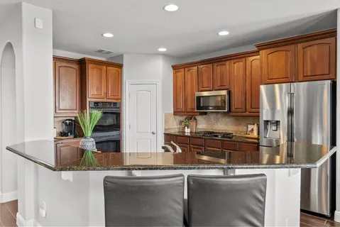 a view of a backyard with garden