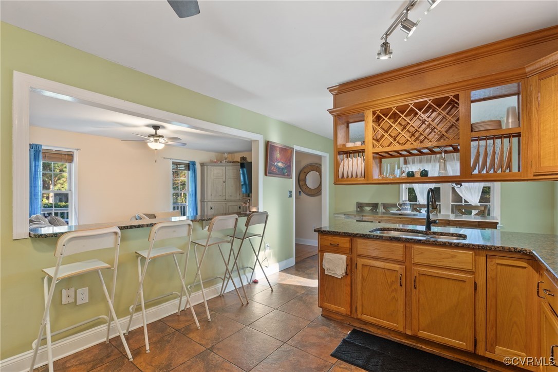 4212 Stigall Drive Chesterfield, VA 23112 - Photo 11 of 35 a living room with furniture a flat screen tv and large window