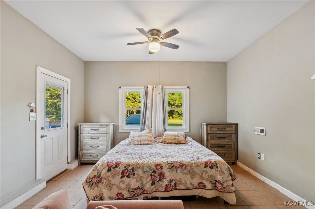 4212 Stigall Drive Chesterfield, VA 23112 - Photo 17 of 35 a bedroom with a bed and window