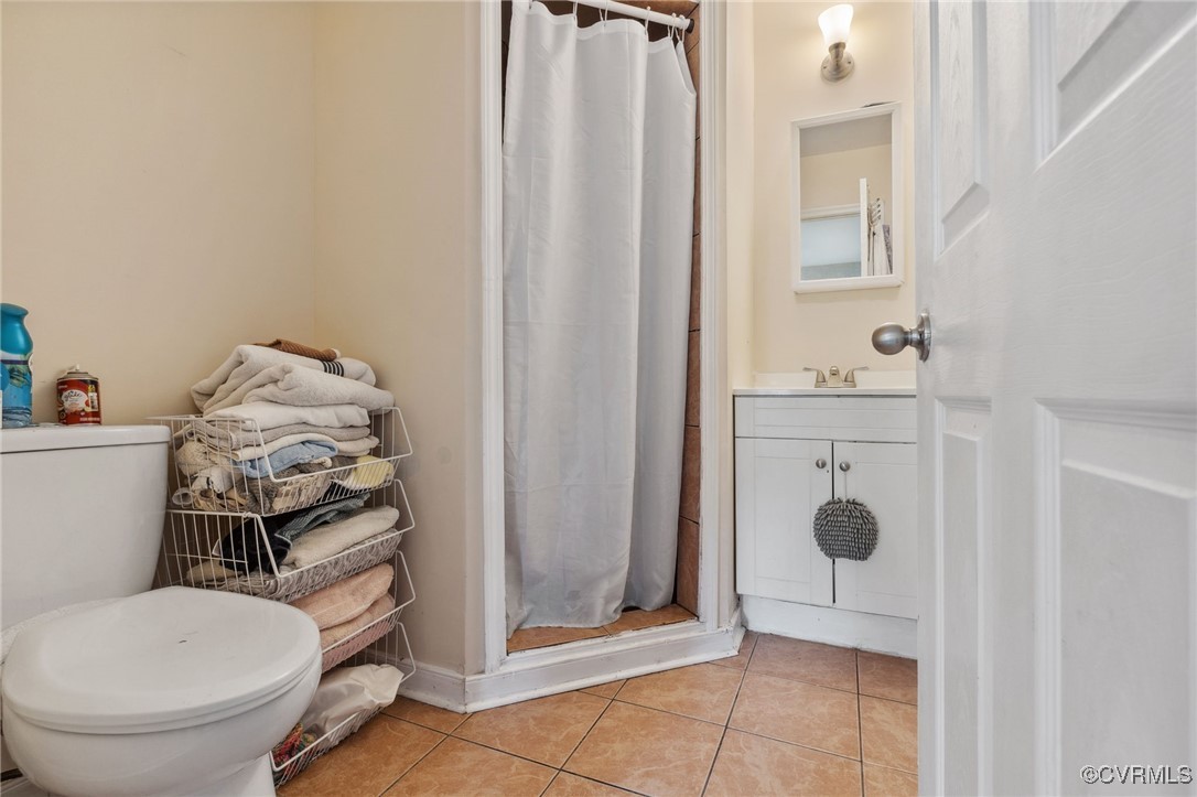 4212 Stigall Drive Chesterfield, VA 23112 - Photo 18 of 35 a bathroom with a toilet and a shower