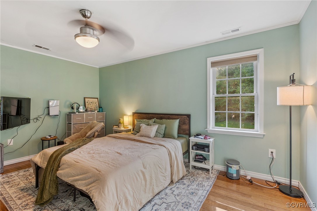 4212 Stigall Drive Chesterfield, VA 23112 - Photo 19 of 35 a bedroom with a bed and a window