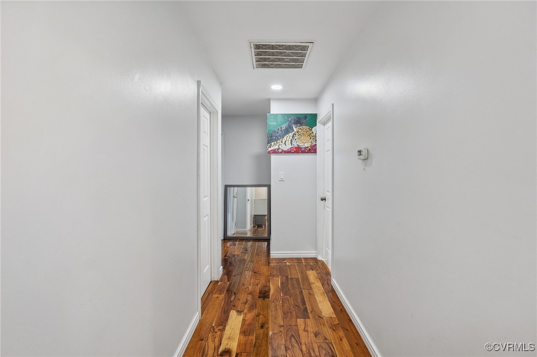 4212 Stigall Drive Chesterfield, VA 23112 - Photo 21 of 35 a view of hallway with wooden floor