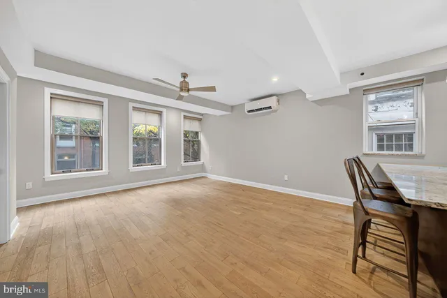a view of a livingroom with furniture and window