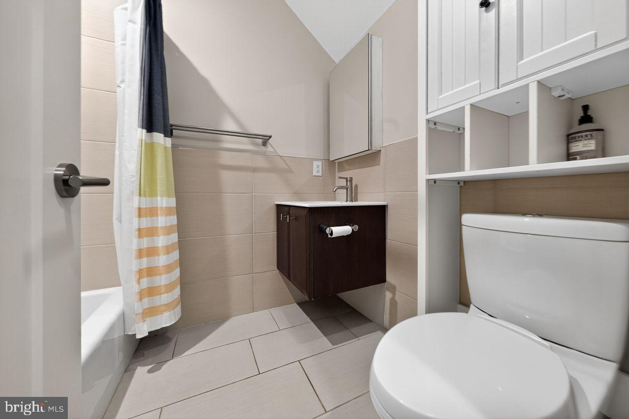 236 South 21st Street, Unit CD Philadelphia, PA 19103 - Photo 23 of 27 a bathroom with a toilet and a shower