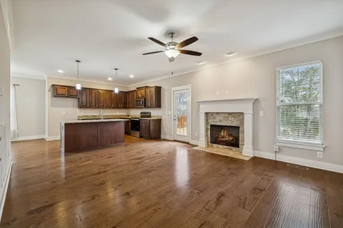 a spacious bathroom with a tub a double vanity sink a double vanity and a mirror
