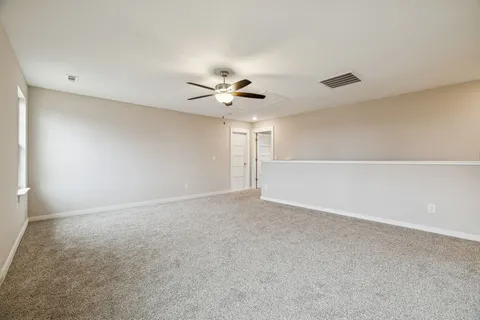 a view of balcony and wooden floor