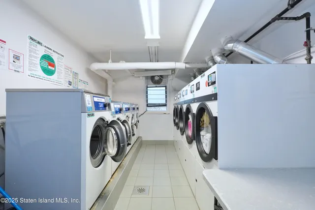 a view of a storage & utility room with washer and dryer