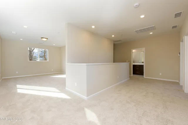 a view of a backyard of the house