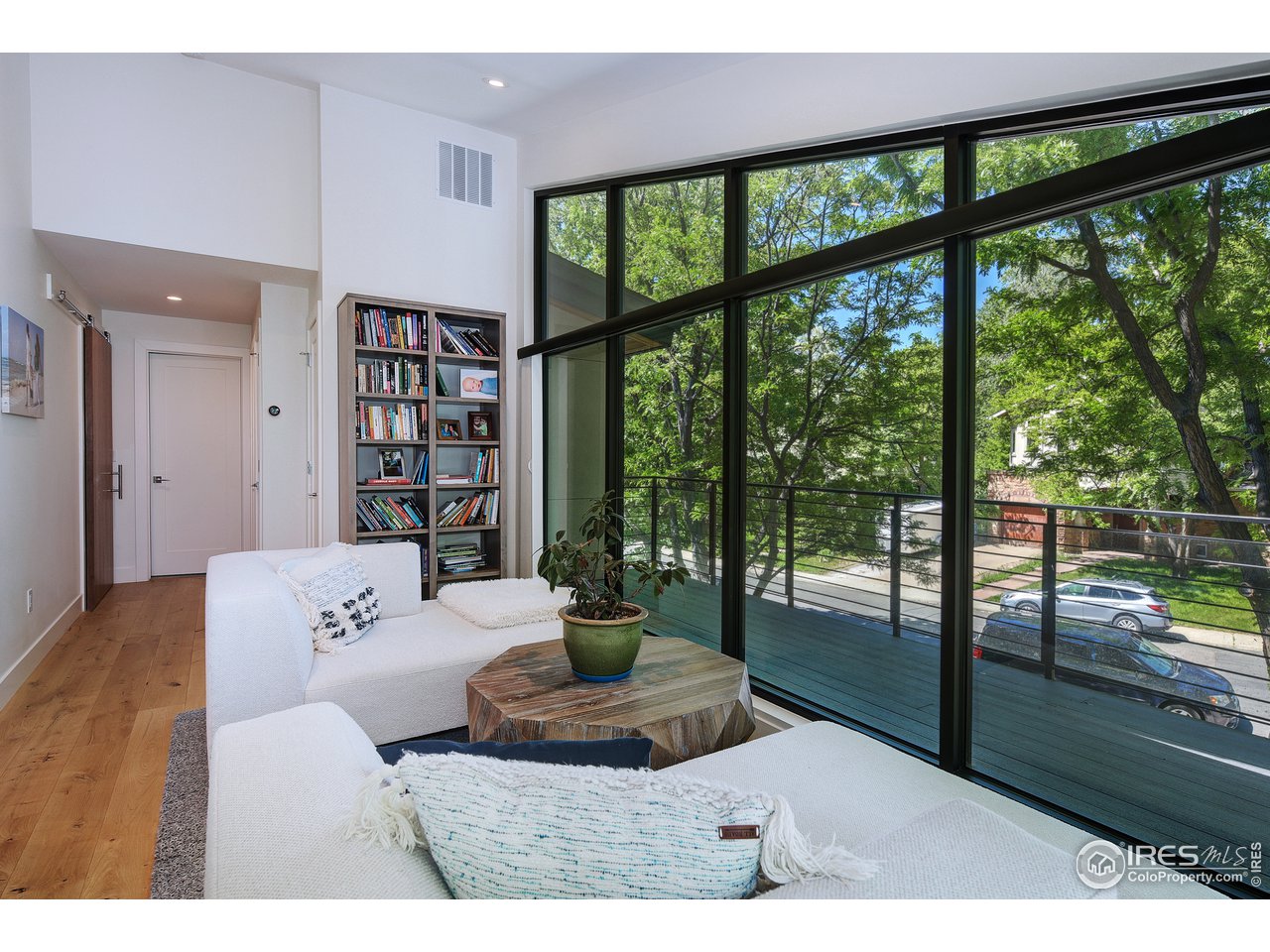 2930 18th Street Boulder, CO 80304 - Photo 19 of 40 a living room with furniture and a large window