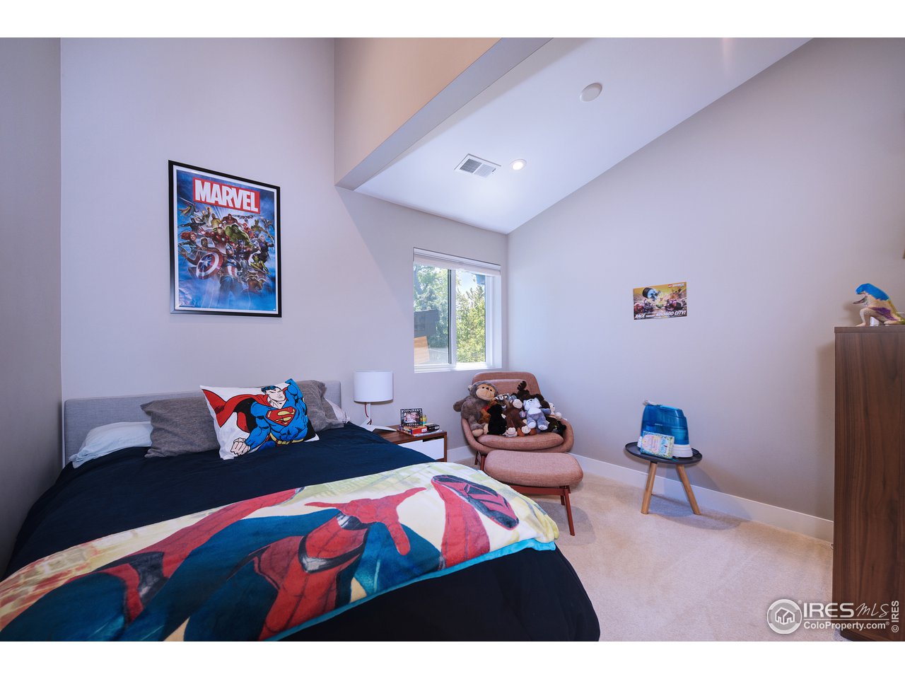 2930 18th Street Boulder, CO 80304 - Photo 25 of 40 a bedroom with furniture and a bed
