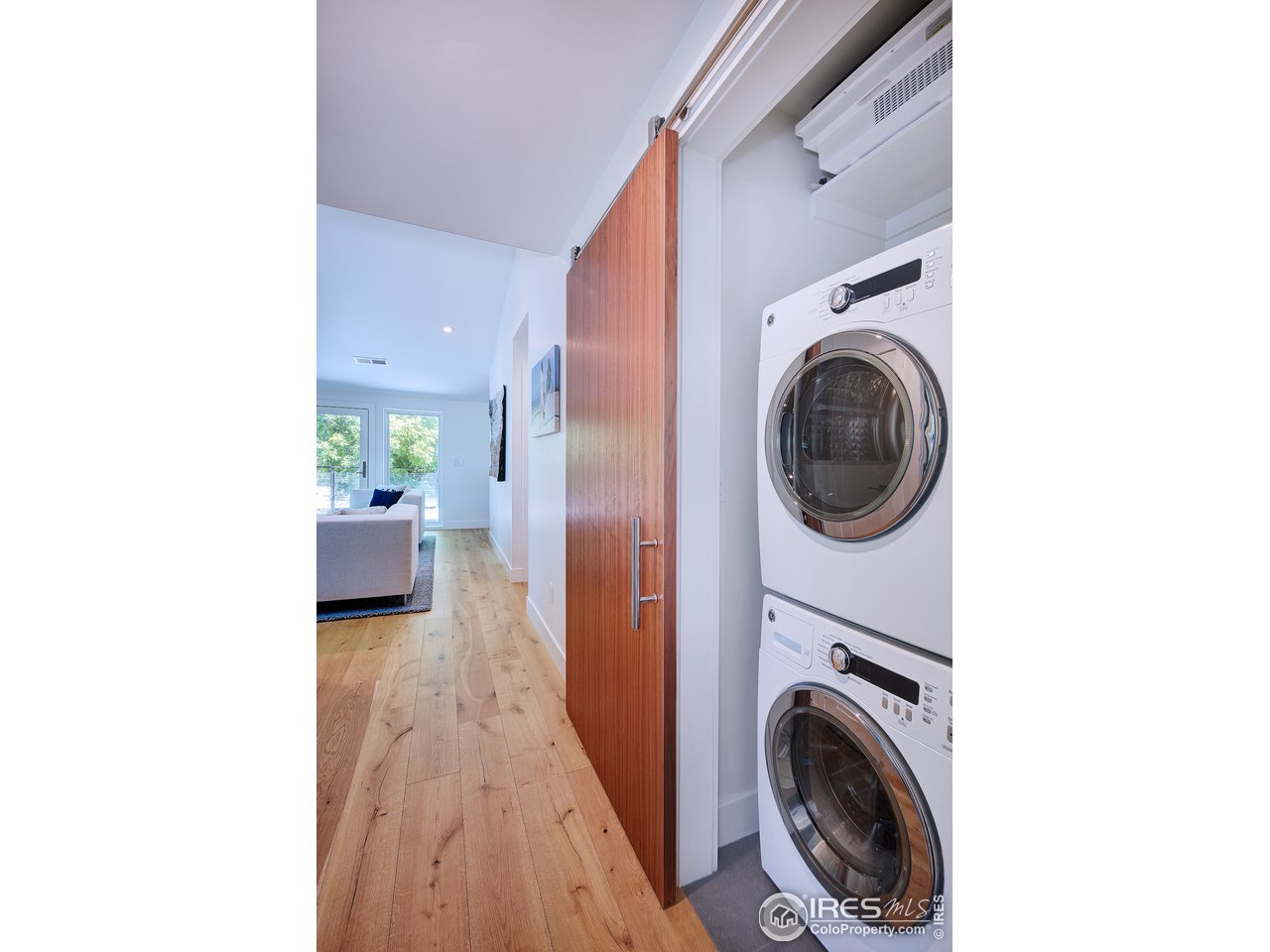2930 18th Street Boulder, CO 80304 - Photo 28 of 40 a view of a hallway with washer and dryer