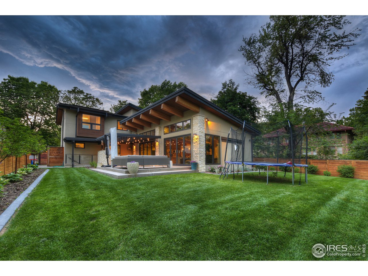 2930 18th Street Boulder, CO 80304 - Photo 37 of 40 a view of a house with a yard porch and sitting area