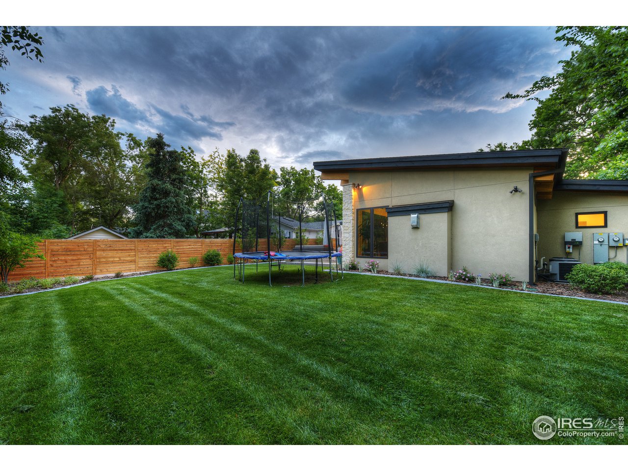 2930 18th Street Boulder, CO 80304 - Photo 38 of 40 a view of a backyard with a garden and entertaining space
