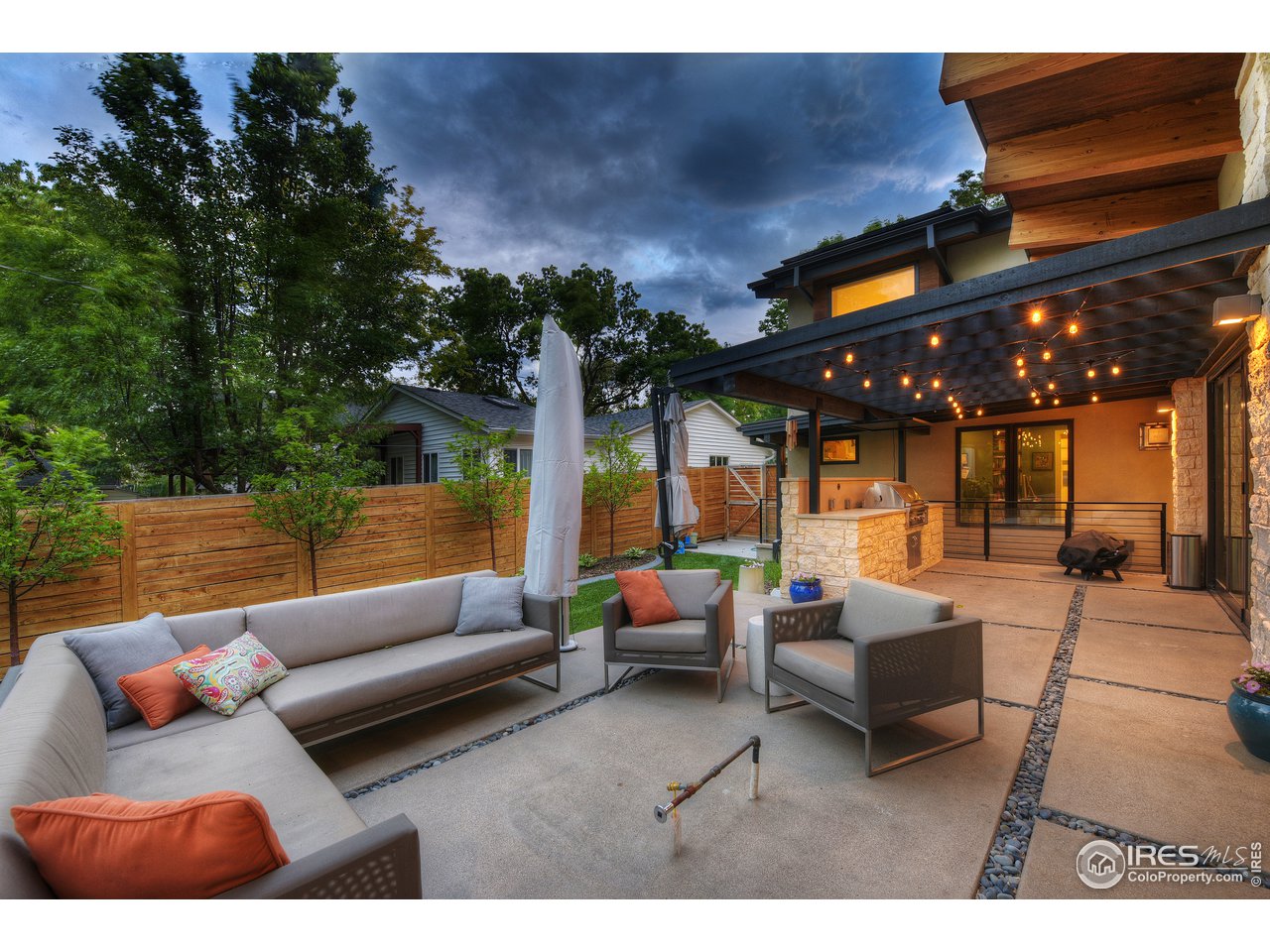 2930 18th Street Boulder, CO 80304 - Photo 40 of 40 a outdoor living space with patio furniture and a fireplace