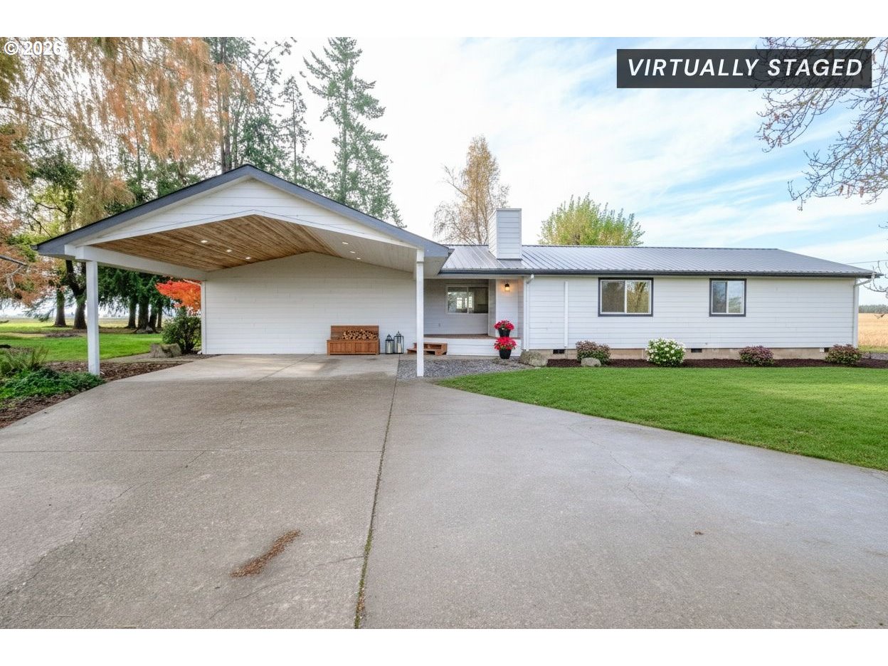 10471 Wagon Road Northeast Mount Angel, OR 97362 - Photo 1 of 48 a view of a house with a yard