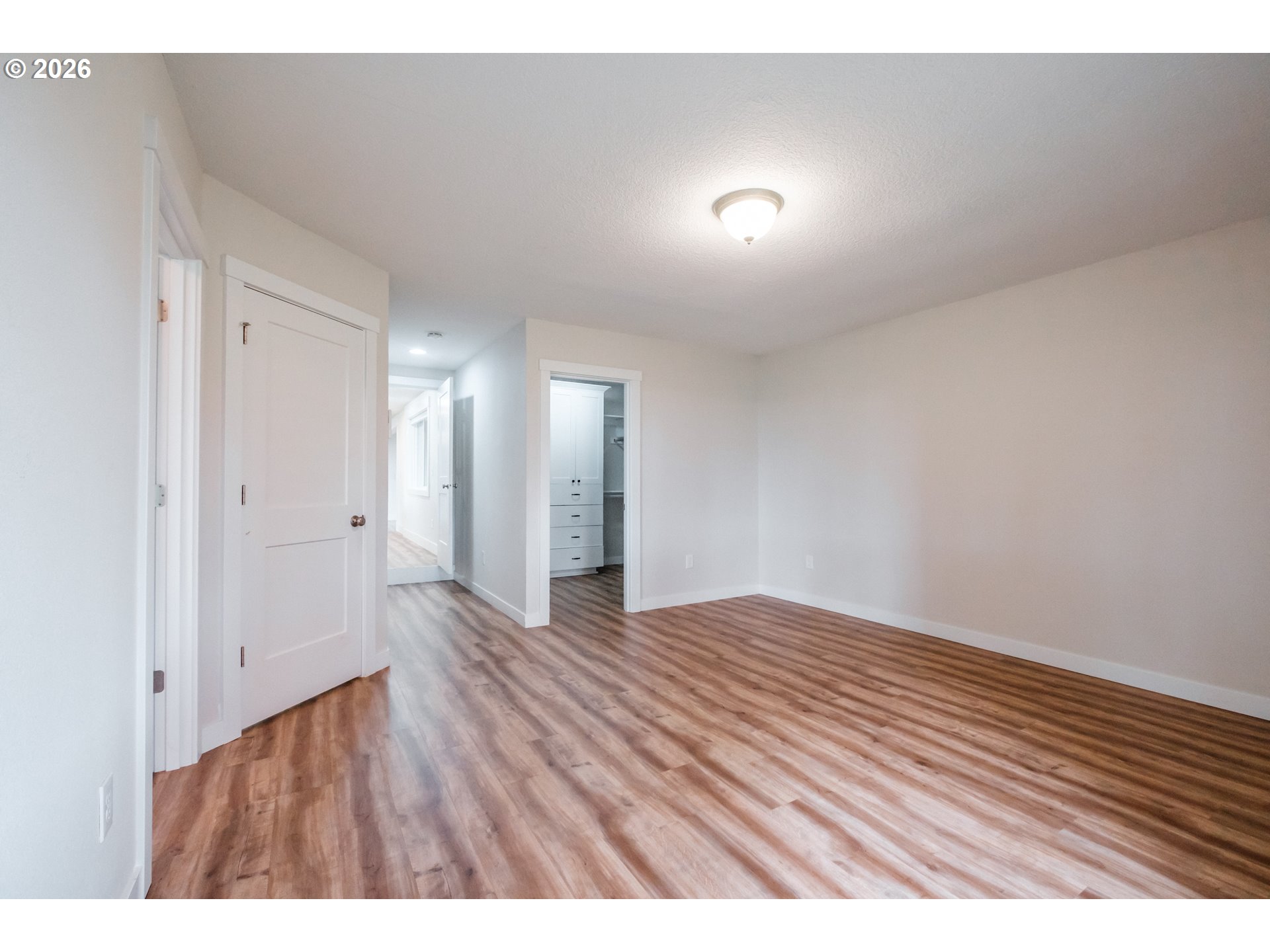 10471 Wagon Road Northeast Mount Angel, OR 97362 - Photo 13 of 48 a view of an empty room and wooden floor