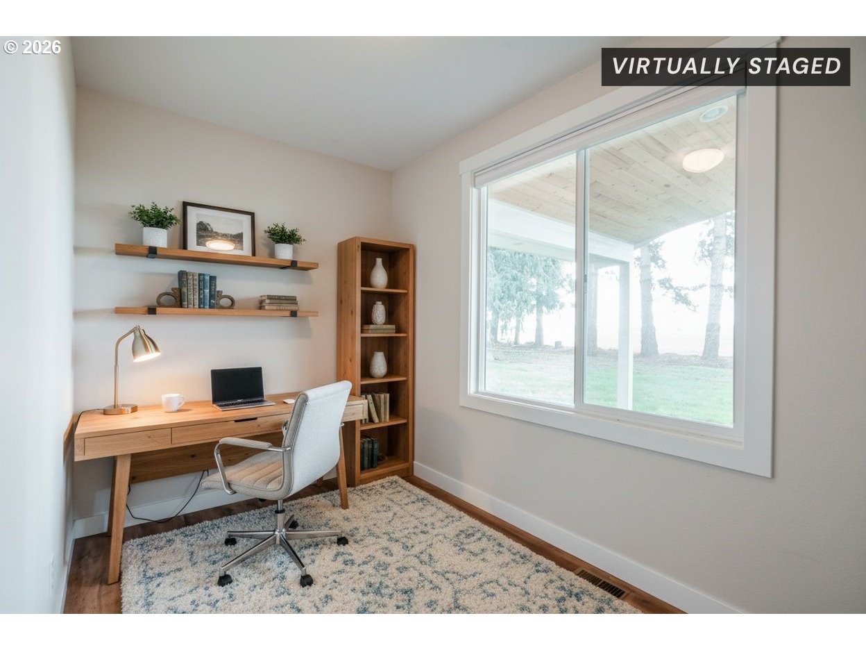 10471 Wagon Road Northeast Mount Angel, OR 97362 - Photo 16 of 48 a living room with furniture and a window