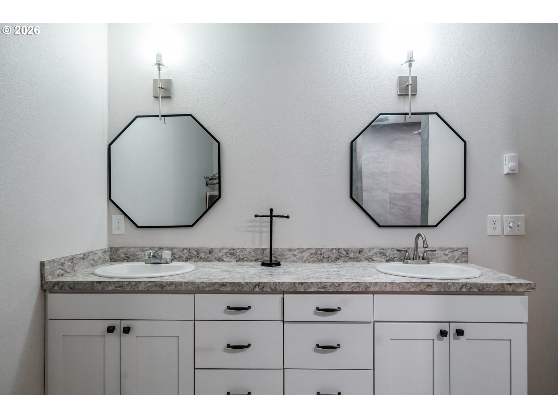 10471 Wagon Road Northeast Mount Angel, OR 97362 - Photo 18 of 48 a bathroom with a double vanity sink double and mirror