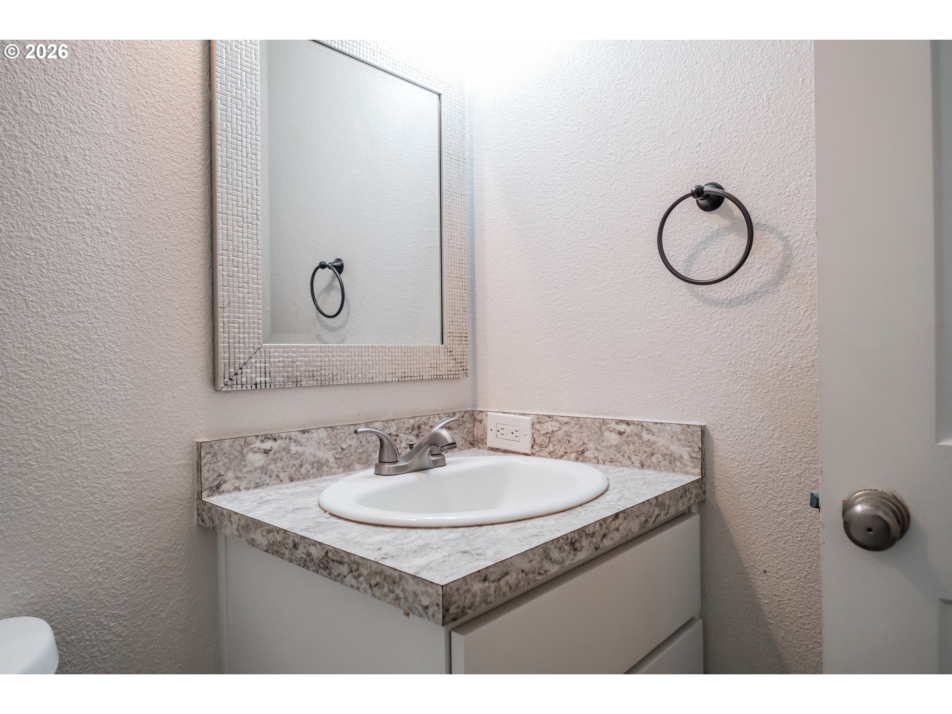 10471 Wagon Road Northeast Mount Angel, OR 97362 - Photo 29 of 48 a bathroom with a granite countertop sink and a mirror