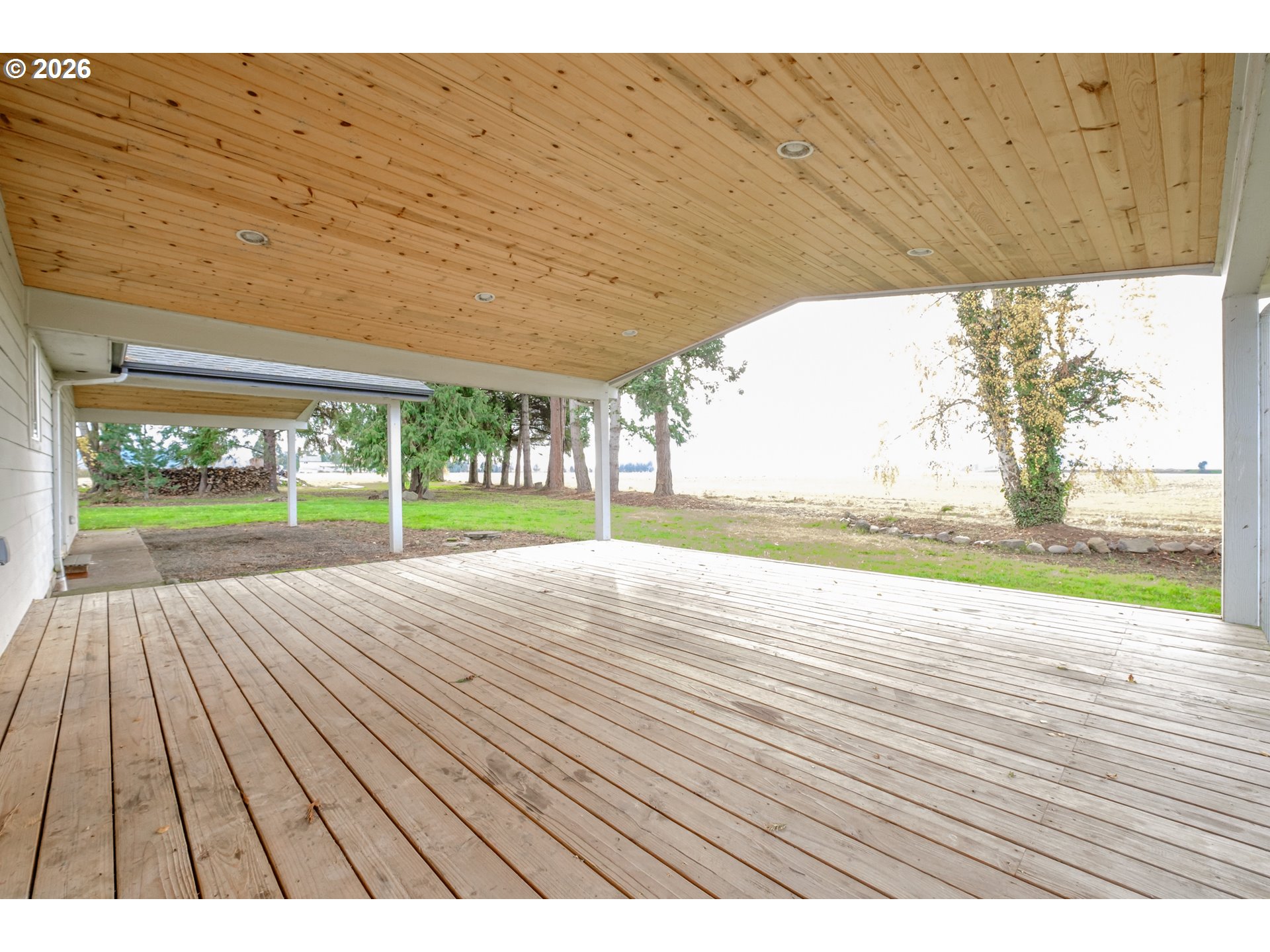 10471 Wagon Road Northeast Mount Angel, OR 97362 - Photo 35 of 48 a view of swimming pool with wooden floor and lake view