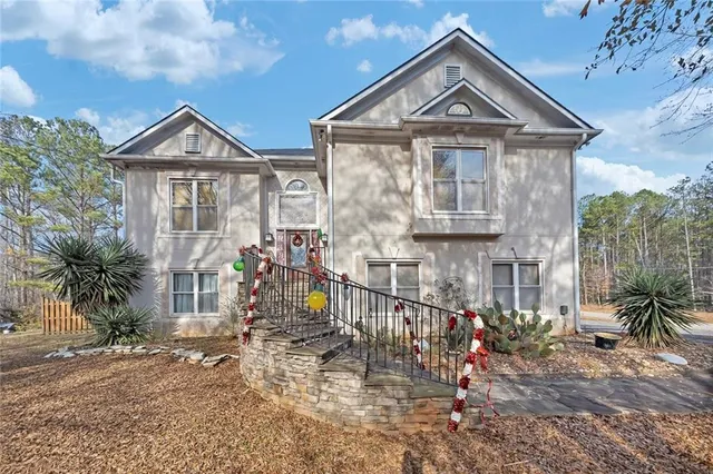 a front view of house with yard