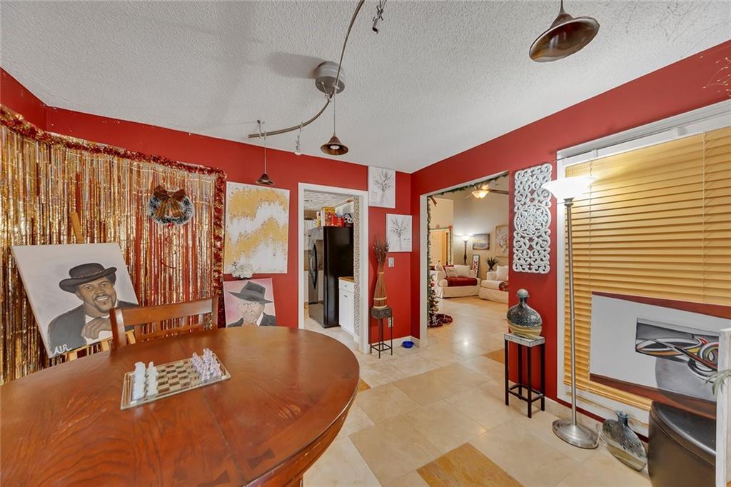 6401 Fox Run Winston, GA 30187 - Photo 14 of 48 a living room with furniture a flat screen tv and large window
