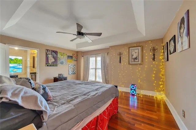 a bedroom with a bed and a table in it