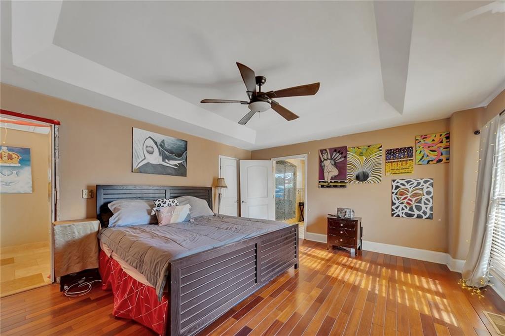 6401 Fox Run Winston, GA 30187 - Photo 22 of 48 a bedroom with a bed and wooden floor