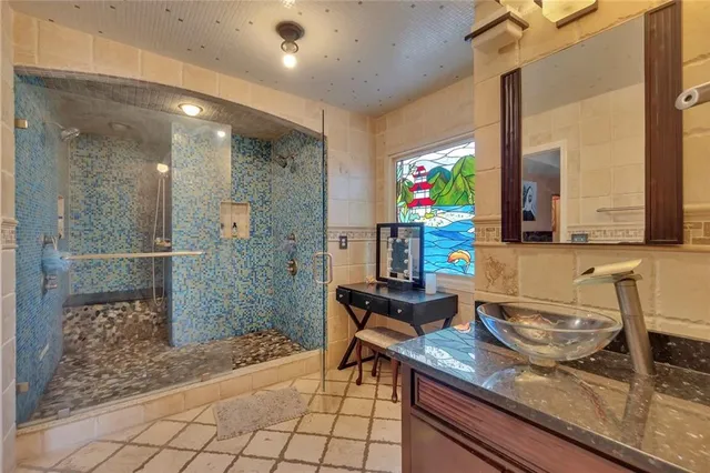 a kitchen with a sink and a refrigerator