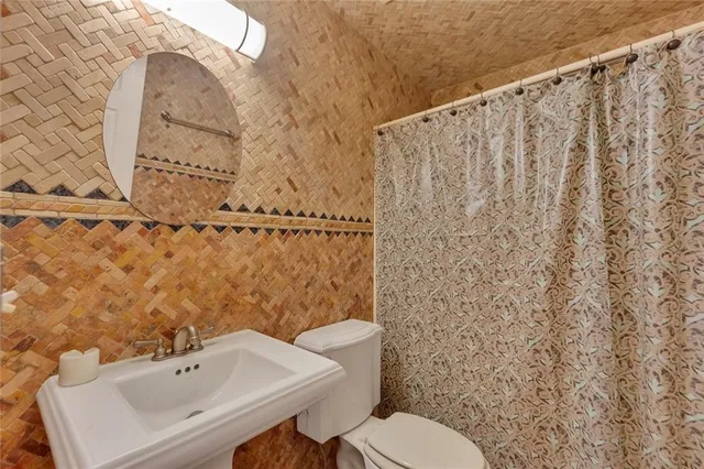 a bathroom with a sink and a toilet