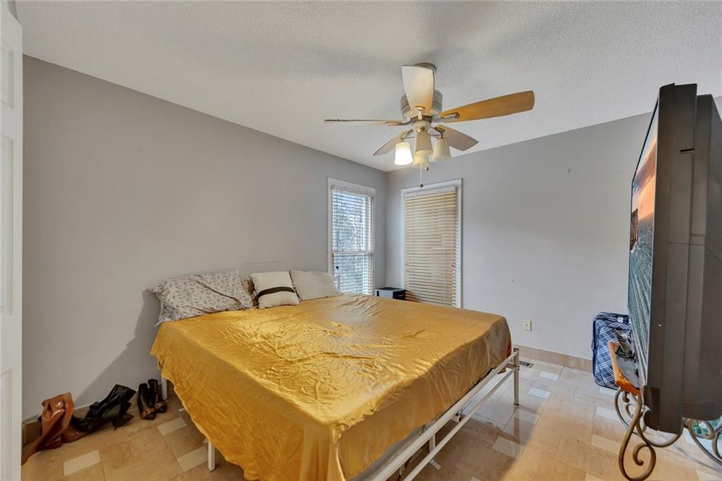 6401 Fox Run Winston, GA 30187 - Photo 28 of 48 a bed sitting in a bedroom next to a window