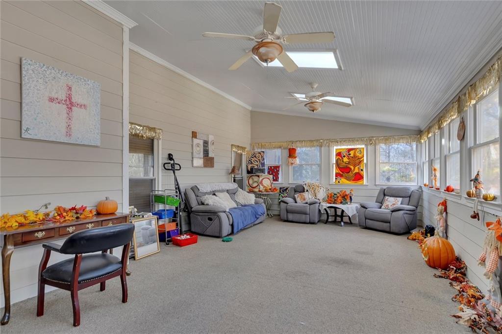 6401 Fox Run Winston, GA 30187 - Photo 35 of 48 a bed room with furniture and a chandelier