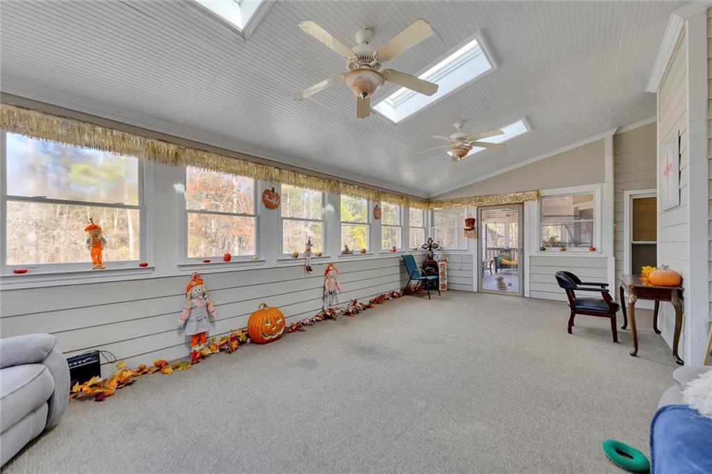 6401 Fox Run Winston, GA 30187 - Photo 36 of 48 a room with gym equipment and a large window