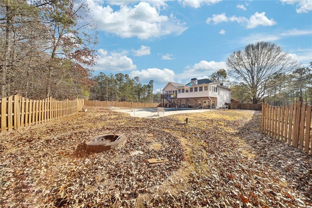 6401 Fox Run Winston, GA 30187 - Photo 45 of 48 a view of a yard with wooden fence