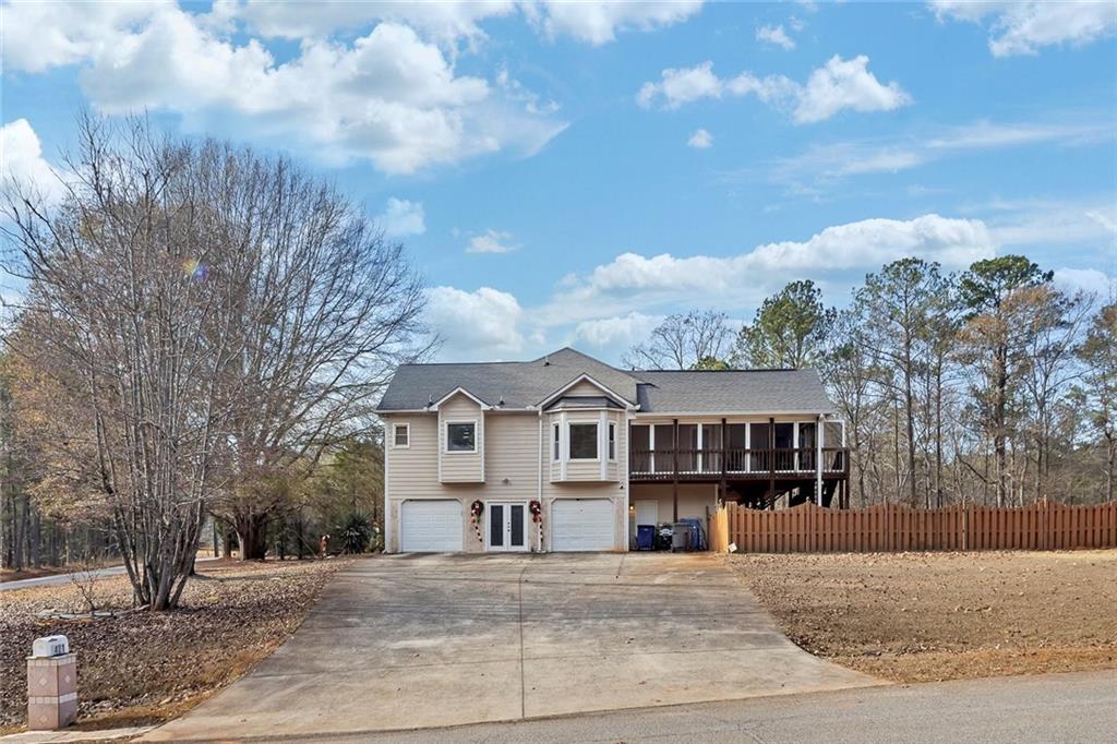 6401 Fox Run Winston, GA 30187 - Photo 6 of 48 a view of multiple houses with a street
