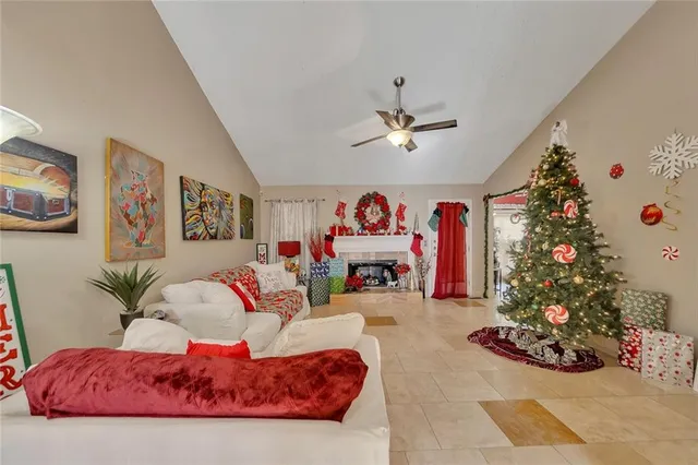 a living room with furniture chandelier and a chandelier