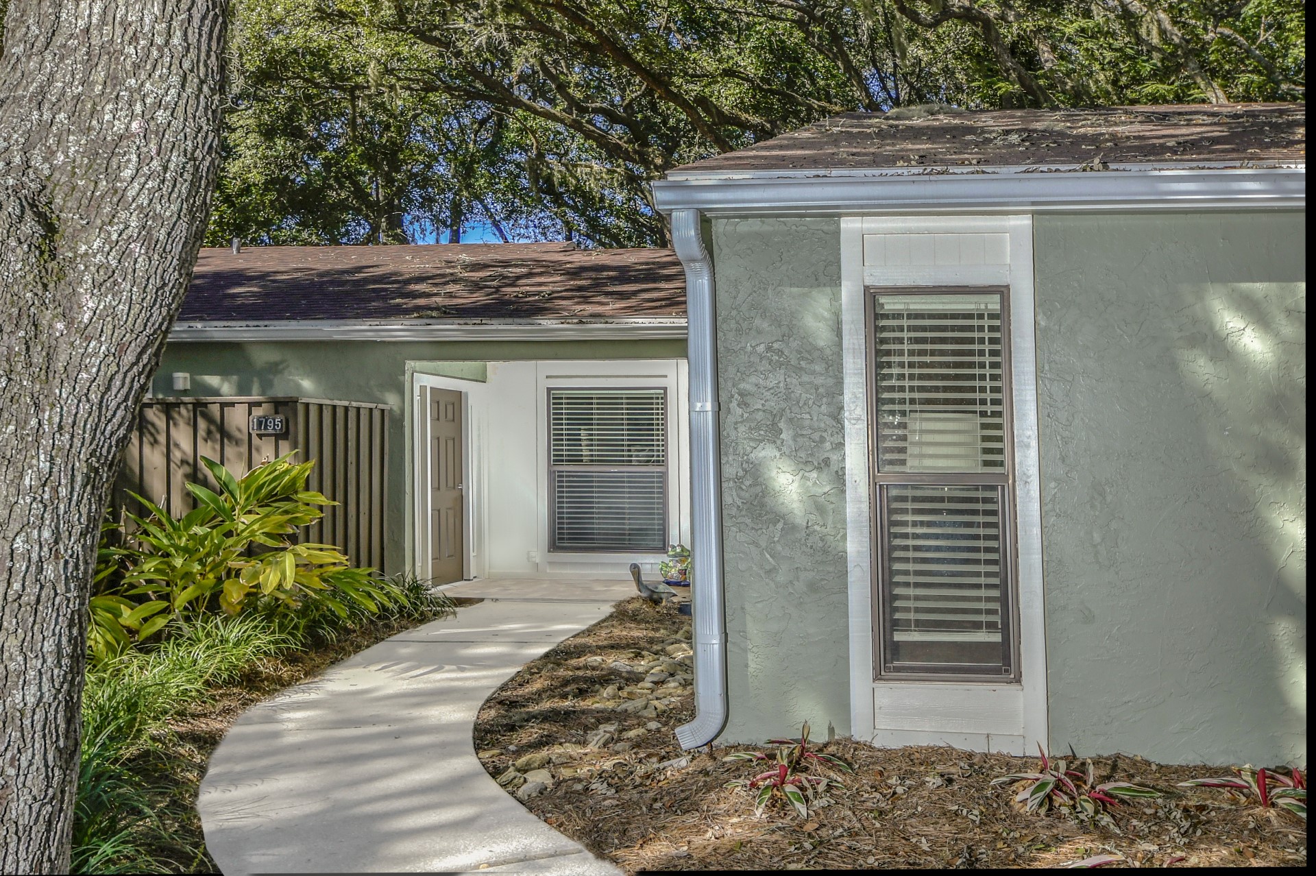 a house view with a outdoor space