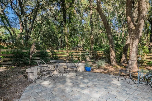 a backyard of a house with lots of green space