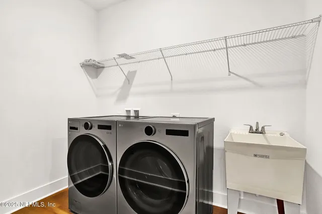 a utility room with dryer and washer
