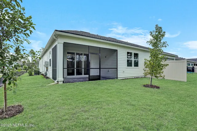 a house with garden in front of it
