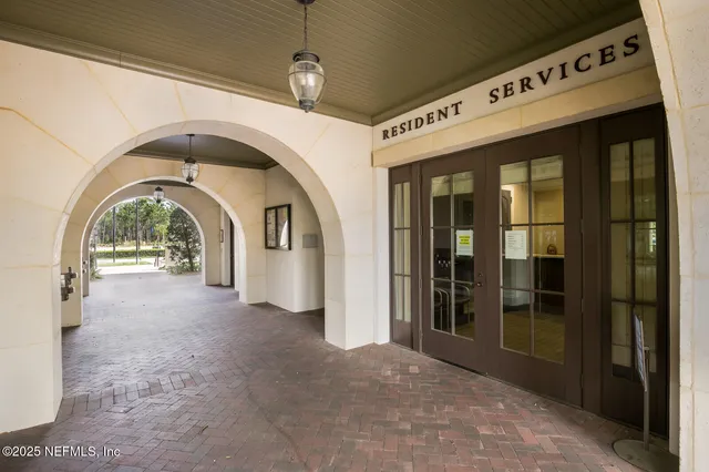 swimming pool view with a sitting space