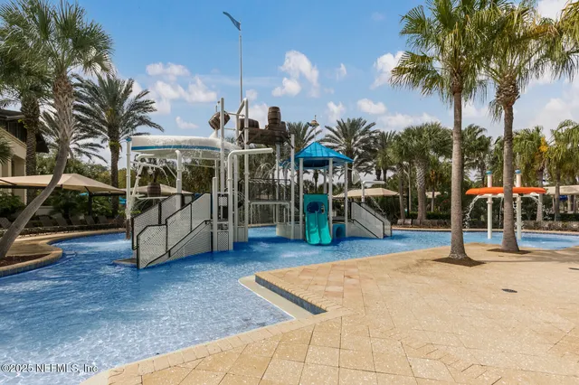 a large room with lots of table and chairs