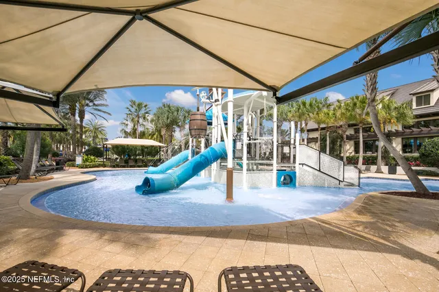 a view of a park with swings