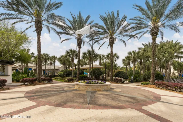 a view of porch with a furniture and floor to ceiling window