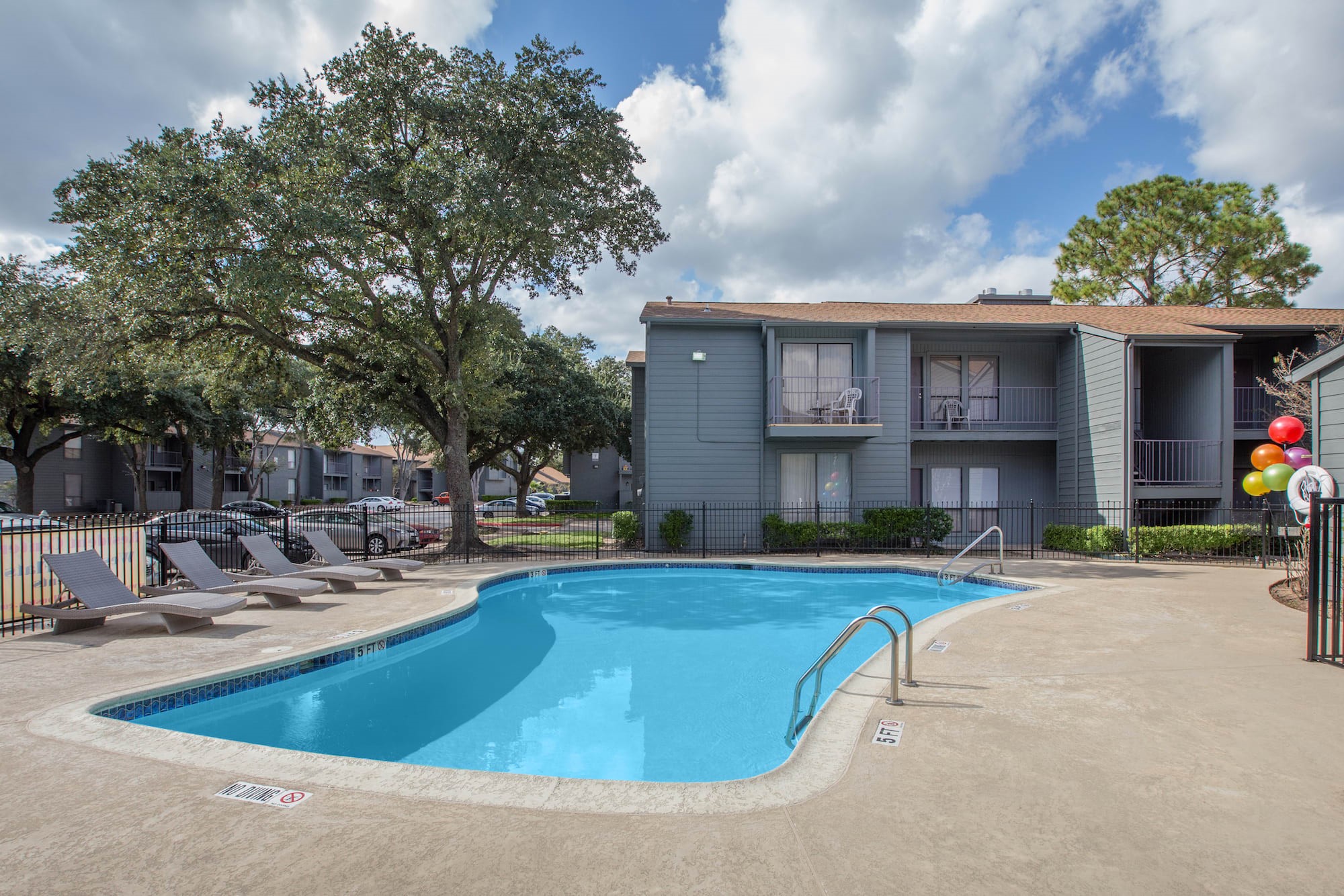 2101 Hayes Road, Unit 1605 Houston, TX 77042 - Photo 16 of 17 a view of a house with swimming pool and sitting area