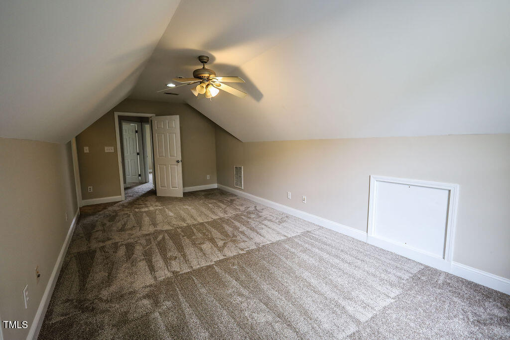10 London Way Spring Lake, NC 28390 - Photo 19 of 26 a view of a livingroom with a ceiling fan